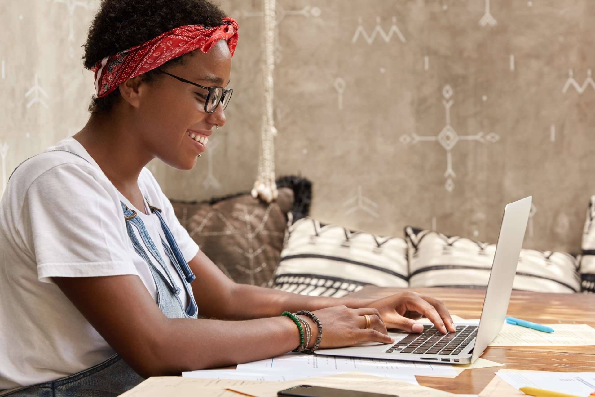 Woman writing on a laptop, representing copywriting services