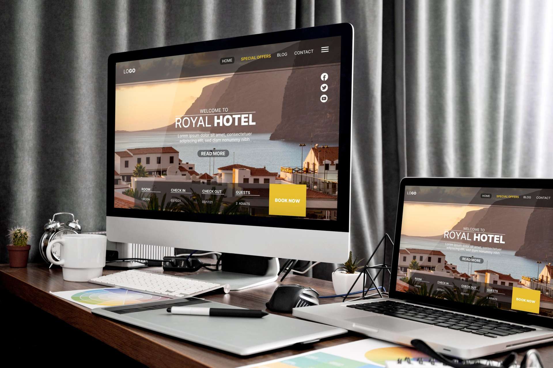 Mac computer and laptop displaying an open website, symbolizing website redesign services.
